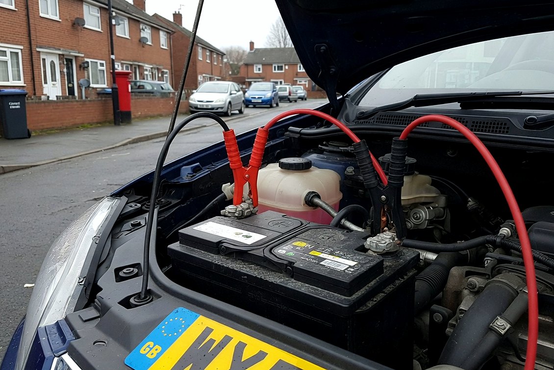 Jump start on a UK car in a residential street